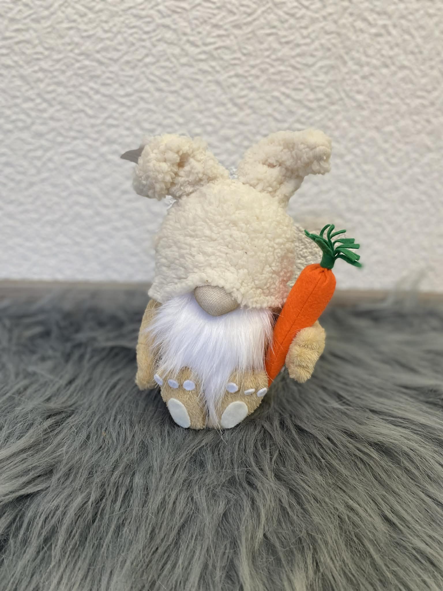 Signature handmade gnome in a whimsical studio setting